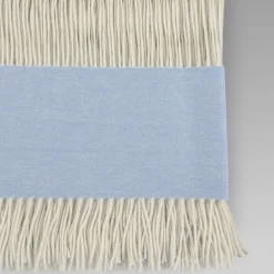 Rivolta Carmignani Coperta piccola azzurra con frange Defilé