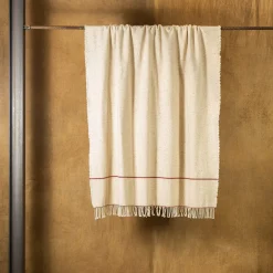 The House of Lyria Dimensioni Coperta beige con frange