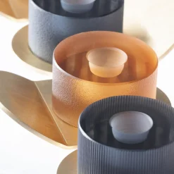 Purho Portacandele Lumino Stripe in acciaio grigio e cristallo di Federico Peri